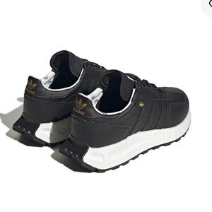 adidas Black and White Retro Runner Sneakers with Gold Accents